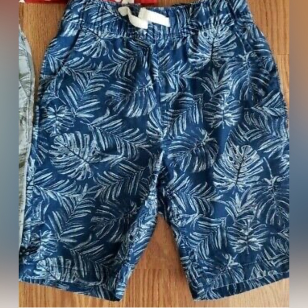Boys blue board shorts size 12. NWT